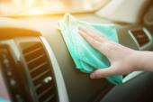 Coronavirus COVID-19 Prevention cleaning,Hand with microfiber cloth cleaning leather seat,auto detailing and valeting concept,washing car care interior,killing corona virus on touching surfaces 551801032