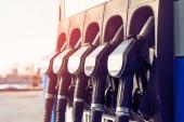 Gas station. Gas station in the mountains. Guns for refueling at a gas station on a sunset day in the summer in the mountains. Car pulls up to refuel. Service 609346826