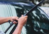 Mechanic replace windshield wipers on car. Replacing wiper blades
Change cars wiper blades. Technician Man changing windshield wipers blades on car. 1658372770