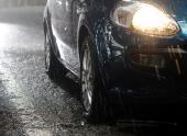 Car stops in the rain