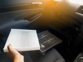 Hand of the car user for maintenance air filter by replacement concept DIY inside his car